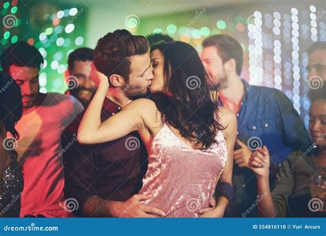 Its His Lucky Night. an Affectionate Young Couple Dancing on a Crowded ...