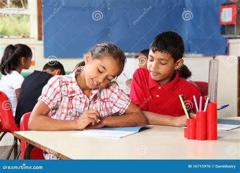 Boy and Girl during School Lesson in Classroom Stock Photo - Image of ...