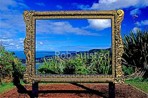 Interpretation panel framing the lookout over the Waitakere Ranges Regional Park and Manukau ...