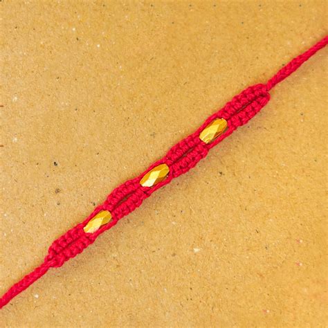 Buy Handmade Macrame Three Gold Beaded Rakhi With Roli Chawal Online On ...