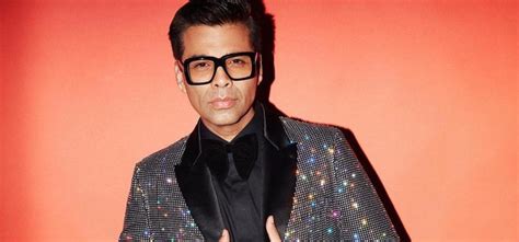 Karan Johar Stepped Out Wearing Newspaper Print Shirt & Neon Sneakers ...