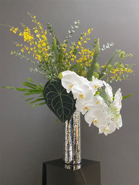 Orchid Flower Arrangements White Orchid Plants In Boat Shaped