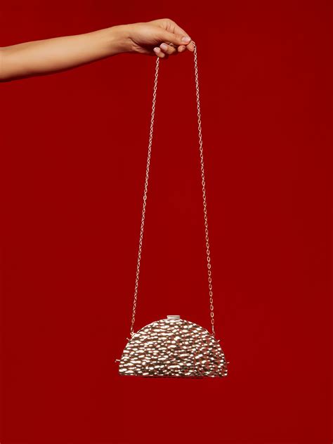 Haute Sauce Women's The Dented Curve Clutch Bag For Casual Wear ...