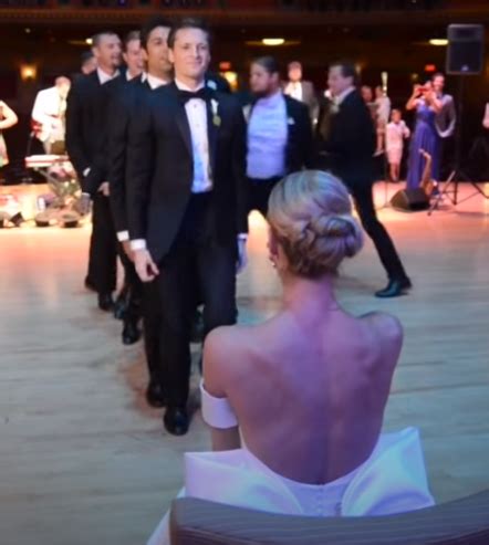 Professional Groomsmen Dancing for Bride 的图像结果