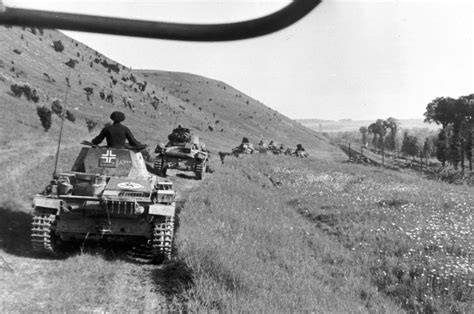 German Panzers of his 7th Panzer Division advancing through the rolling ...
