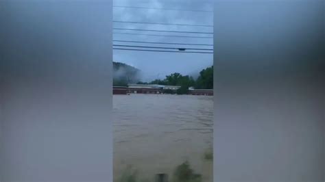 Watch: Buckhorn, Kentucky school submerged in water from historic ...