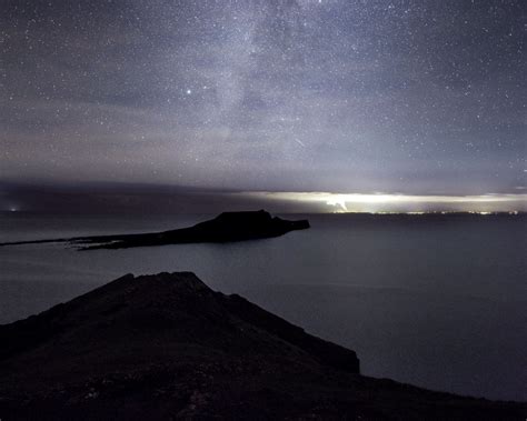 Download wallpaper 1280x1024 island, sea, starry sky, night, dark ...