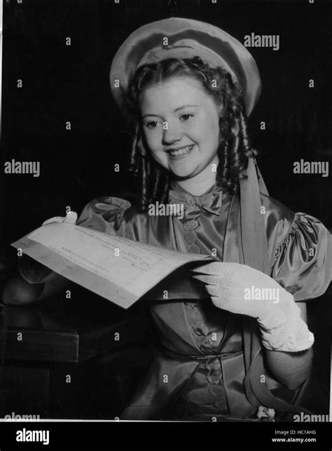 Marcia Mae Jones, signing a movie contract, July 1937 Stock Photo - Alamy