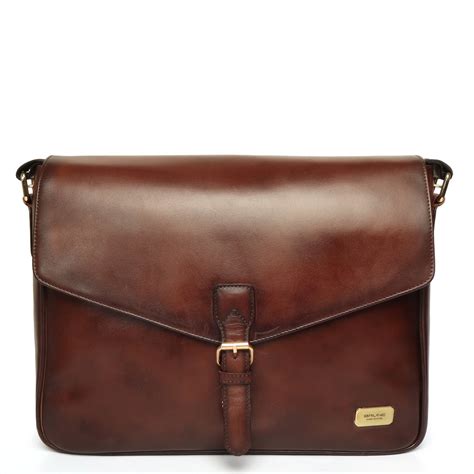 Brown laptop messenger bag with flap opening and push buckle lock by B