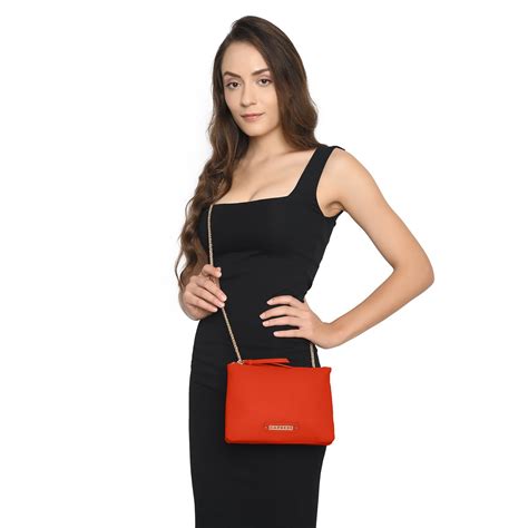 Buy Caprese Candy Sling Small Orange @ Rs.599 | Caprese Bags – Elite ...