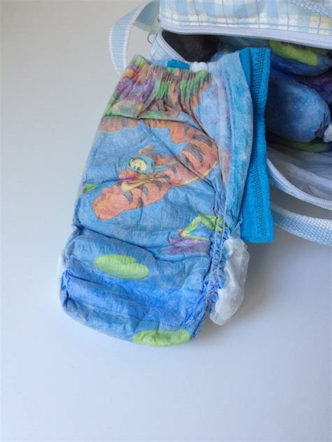 New Diaper Bag CUTIE PIE filled with HUGGIES swimpants and disposable pads