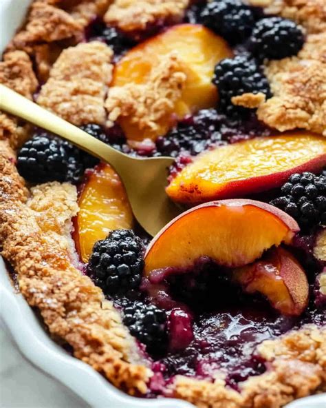 Grandma’s Peach Cobbler with Blackberries Recipe - YummyHere