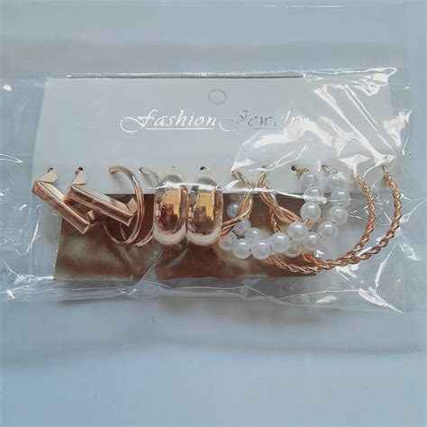 Gold and white colour earrings. 6 pairs. - Depop