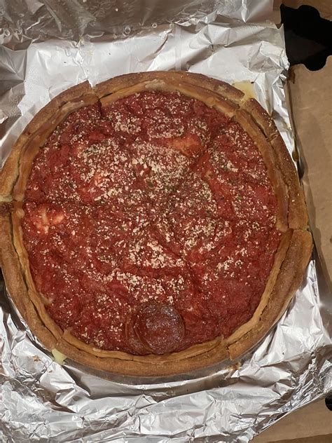 The weight of my fav pizza place in the city. Art of pizza. : r/chicago