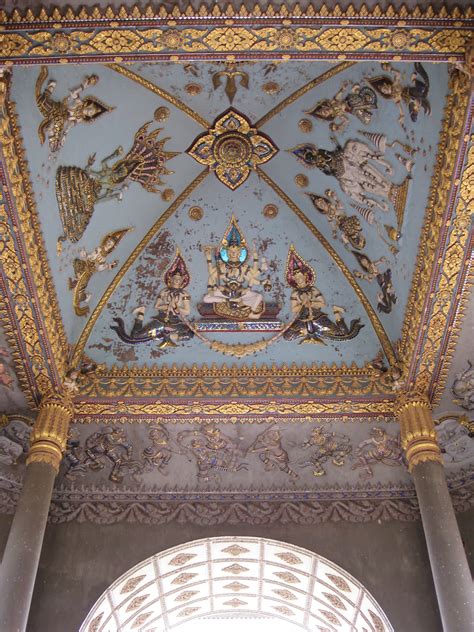 Download Majestic Ceiling Artistry of Pataxui War Monument in Laos Wallpaper | Wallpapers.com