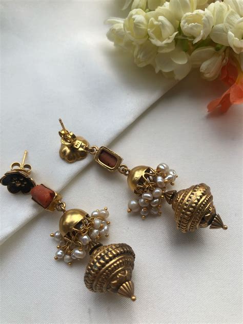 Coral flower earrings with antique style bead drops | House of Taamara