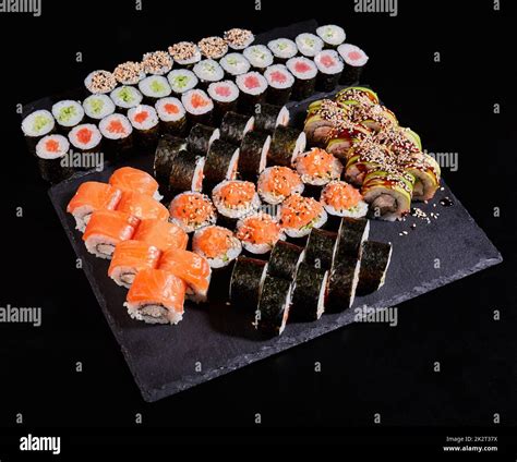 Different types of sushi roll set with salmon, vegetables, fish ...