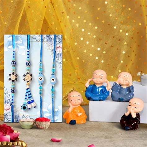 Buy ascension Rakhi Gift Combo Rakhi with Buddha Monk Statue for Gift ...
