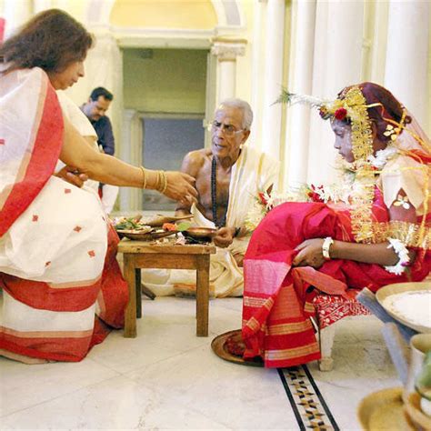 Prime Minister Manmohan Singh and his wife Gursharan Kaur pose with ...