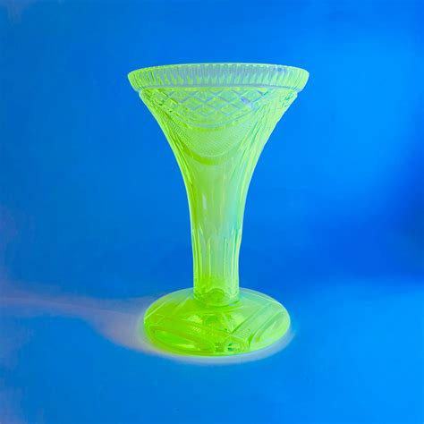 ANTIQUE URANIUM GLASS FOOTED VASE - GLASS ET CETERA