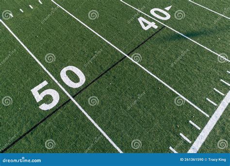 Football Field at the 50 Yard Line Stock Photo - Image of sport, aerial ...