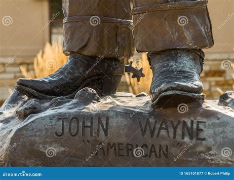 John Wayne Sculpture in Front of the John Wayne Museum Editorial ...