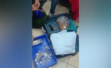 VIDEO : IGI एयरपोर्ट पर 'लहंगे' के बटन में 41 लाख रुपये की विदेशी ...