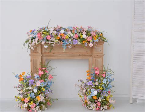 Mantel and Floor Floral Arrangements in Pastel Wildflower Theme With ...