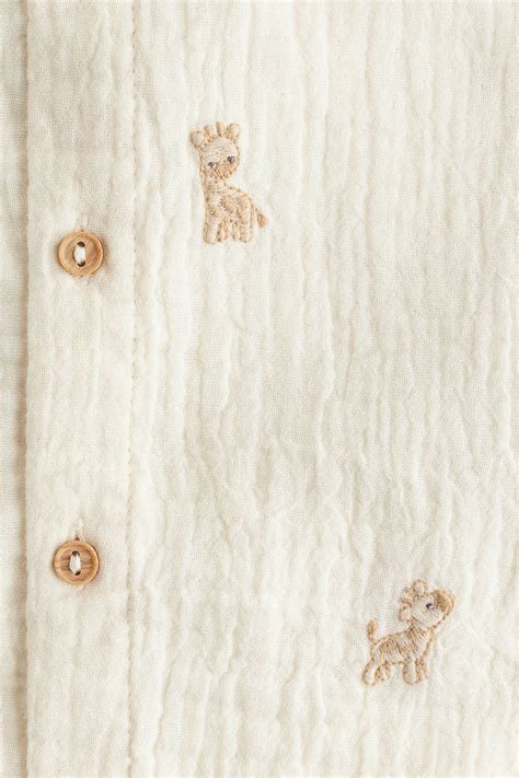 Embroidery-detail romper suit - Light beige/Giraffes - Kids | H&M IN