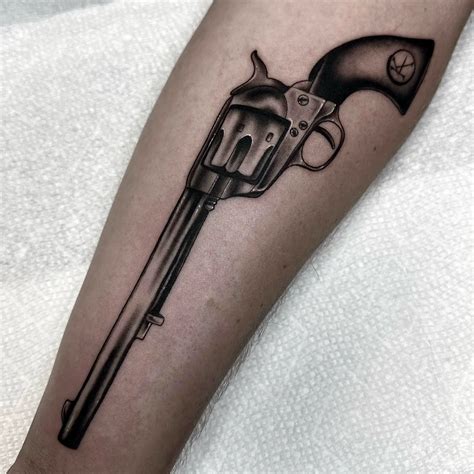 15 Bold and Unique Revolvers Tattoos Ideas for Inspiration