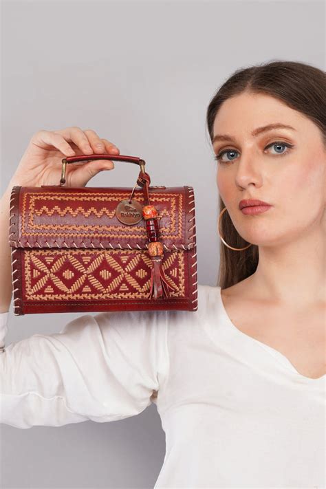 Brown Kutchhi Hut - The Sling - RAKHIYO