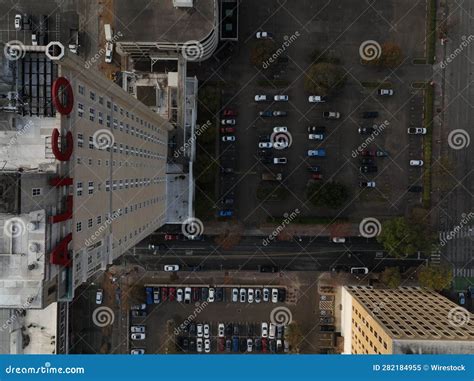 Street Scene Featuring Cars Parked in Front of the Alico Building in ...