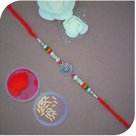 Buy quality Swastik Oxodized 925 Silver Rakhi in Rajkot
