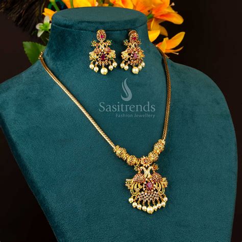 Elegant Micro Gold Plated Peacock Pendant American Diamond Necklace Set ...