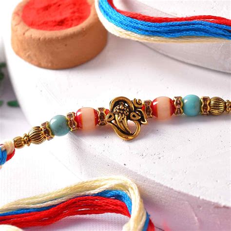 Designer Om Colourful Rakhi – TOKENZ