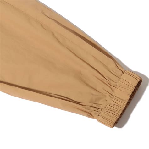 atmos pink シリコンパッチ ジョガーパンツ BEIGE（アトモスピンク シリコンパッチ ジョガーパンツ-ベージュ） | atmos ...