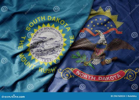 Big Waving Colorful National Flag of North Dakota State and Flag of ...