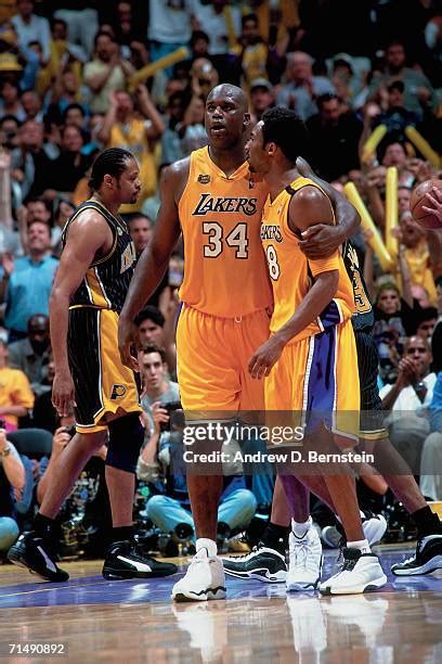 Shaquille Oneal Holding Photos and Premium High Res Pictures - Getty Images