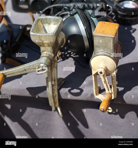 Two old meat grinders, meat grinder attached to a table Stock Photo - Alamy