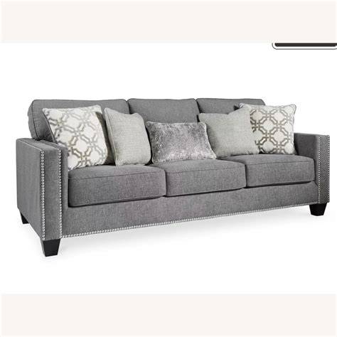 Ashley Furniture Grey Chinelle Sofa With Stud Detail - AptDeco