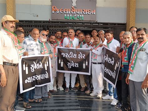 A sit-in at the Collector's office regarding the brutal killing of a ...