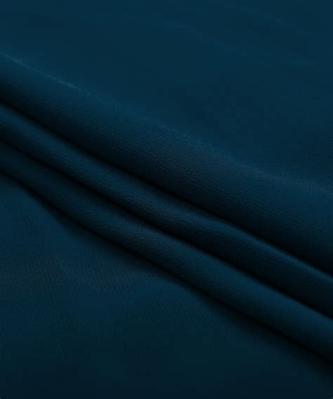 Buy Dark Teal Plain Faux Georgette Fabric Online At Wholesale Prices ...