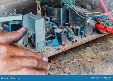 Electrician Repairing a TV in Old Television Repair Shop Stock Photo ...