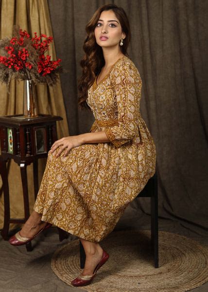 Casual mustard floral printed gathered dress with highlighted with bea ...