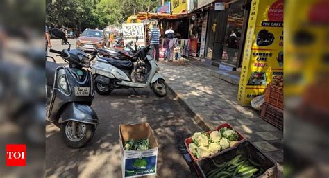 footpath encroachment - Times of India