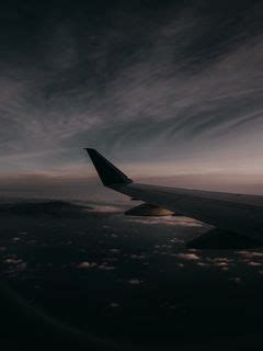 Download wallpaper 240x320 plane, wing, clouds, sky, twilight old ...