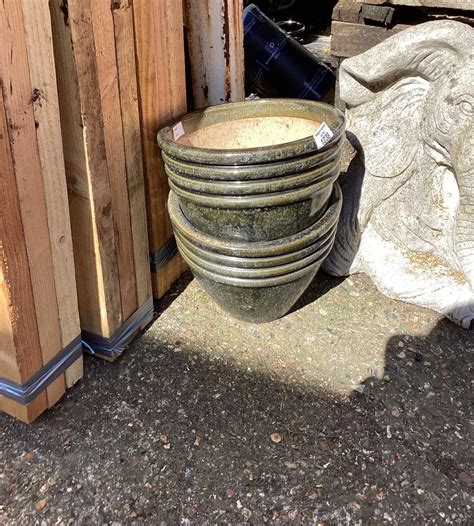 Seven glazed garden pots – Badgers Auctions