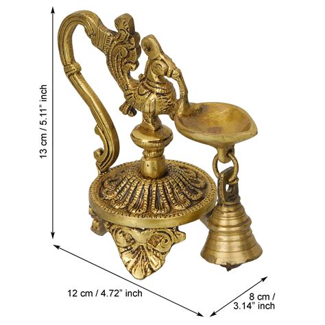 Golden Decorative Handcrafted Peacock Brass Showpiece with Diya Stand ...