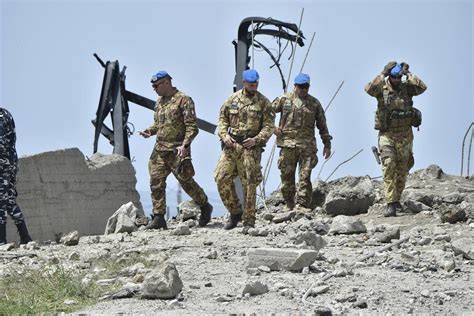 FILE PHOTO: United Nations peacekeepers (UNIFIL) and Lebanese army soldiers stand guard at a checkpoint in Naqoura, near the Lebanese-Israeli border, southern Lebanon, October 27, 2022. REUTERS/Aziz Taher/File Photo