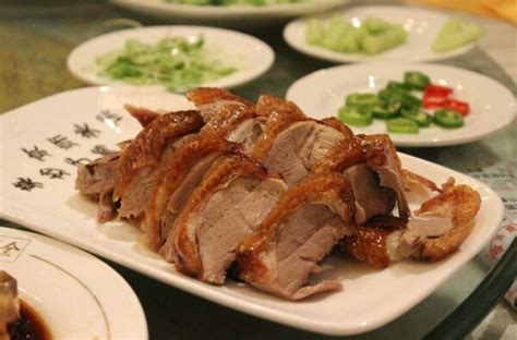 全聚德烤鸭传承百年，被称“中华第一吃”，为何现在没人愿意去？_腾讯新闻